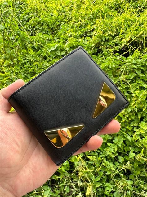 fendi bug eyes wallet|fendi wallet price.